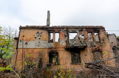 destroyed and burned houses in the city Russia Ukraine war