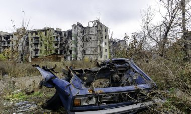damaged and looted cars in a city in Ukraine during the war with Russia