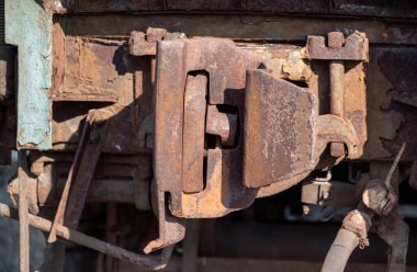 old iron connection train wagon coupler close up