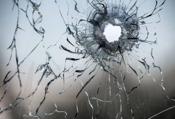 Bullet Hole Window Glass Cracks Abstract Background Close War — 图库照片