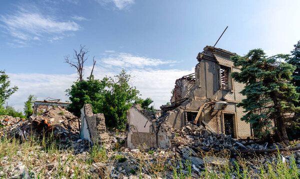 Destroyed and burned houses in the city during the war in Ukraine