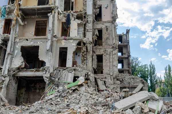 stock image destroyed and burned houses in the city during the war in Ukraine