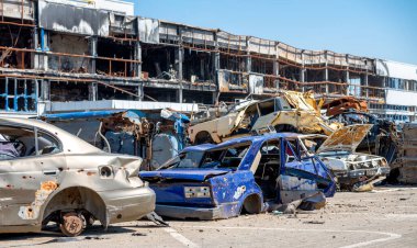 damaged and looted cars in a city in Ukraine during the war with Russia