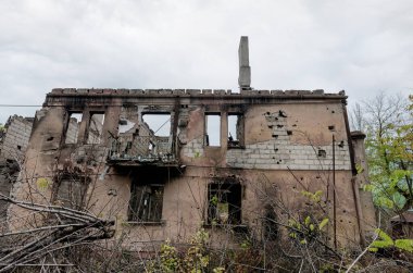 destroyed and burned houses in the city Russia Ukraine war