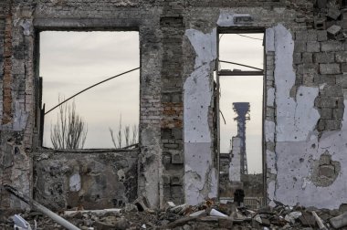 destroyed and burned houses in the city during the war in Ukraine clipart