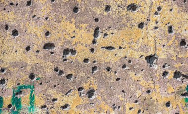pattern explosion-damaged wall of the house of the war in Ukraine