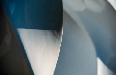 geometrik şekillerin eğri çizgilerinden mavi ve gri soyut arkaplan minimalist tasarım deseni