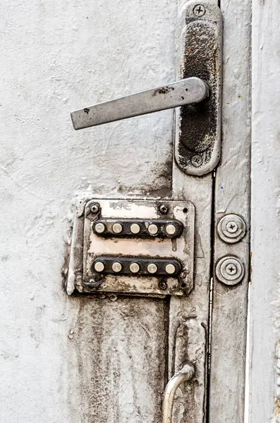 old digital combination lock on an iron door close up
