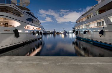 many ships at night on the pier without people in the Aegean Sea Athens Greece