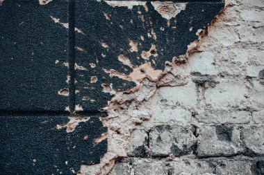 pattern explosion-damaged wall of the house of the war in Ukraine