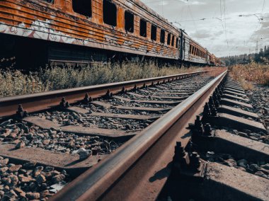 burned out blown up wagons war between Russia and Ukraine