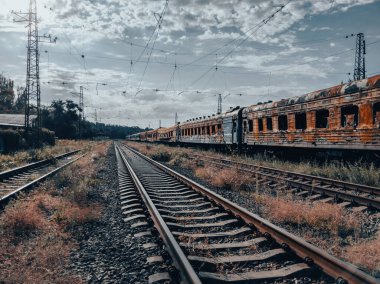 burned out blown up wagons war between Russia and Ukraine
