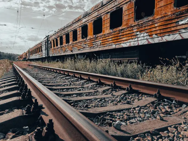 burned out blown up wagons war between Russia and Ukraine