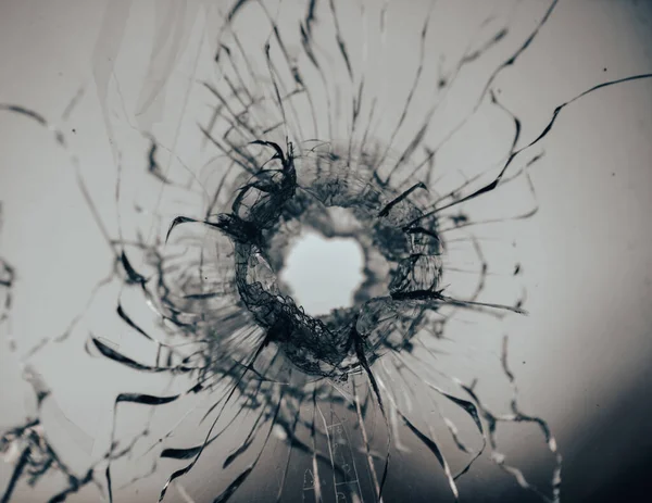 Bullet Hole Window Glass Cracks Abstract Background Close War Stok Resim
