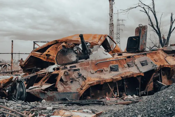 burnt tank and destroyed buildings of the Azovstal plant shop in Mariupol war in Ukraine with Russia