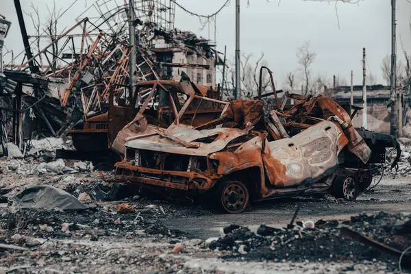 burnt cars and destroyed buildings of the workshop of the Azovstal plant in Mariupol war in Ukraine with Russia