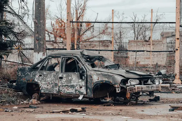 burnt car and destroyed buildings of the workshop of the Azovstal plant in Mariupol war in Ukraine with Russia