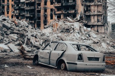 damaged and looted cars in a city in Ukraine during the war with Russia