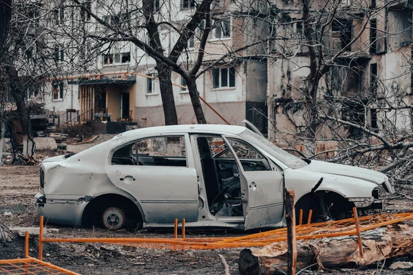damaged and looted cars in a city in Ukraine during the war with Russia