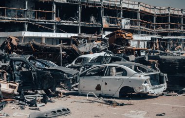 damaged and looted cars in a city in Ukraine during the war with Russia