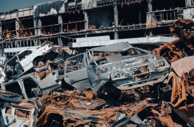 damaged and looted cars in a city in Ukraine during the war with Russia