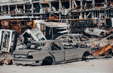 damaged and looted cars in a city in Ukraine during the war with Russia