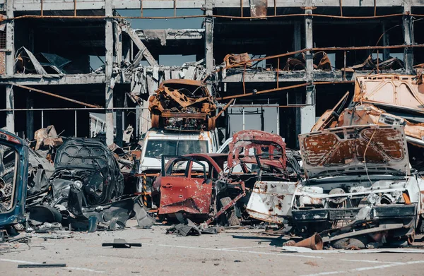 damaged and looted cars in a city in Ukraine during the war with Russia