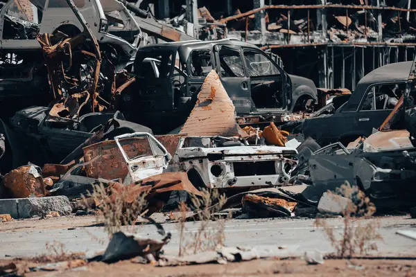 damaged and looted cars in a city in Ukraine during the war with Russia