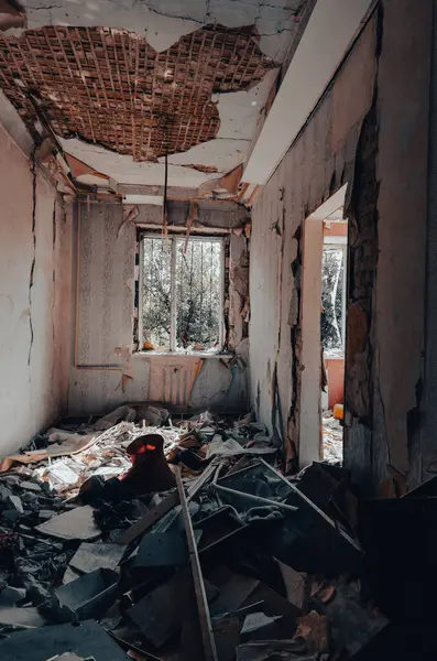 inside a destroyed house without people in an abandoned city war in Ukraine