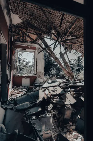 inside a destroyed house without people in an abandoned city war in Ukraine