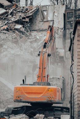 construction equipment destroys affected houses war in Ukraine with Russia