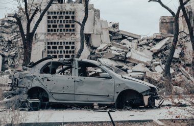 damaged and looted cars in a city in Ukraine during the war with Russia