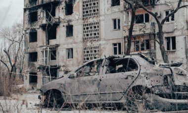 damaged and looted cars in a city in Ukraine during the war with Russia