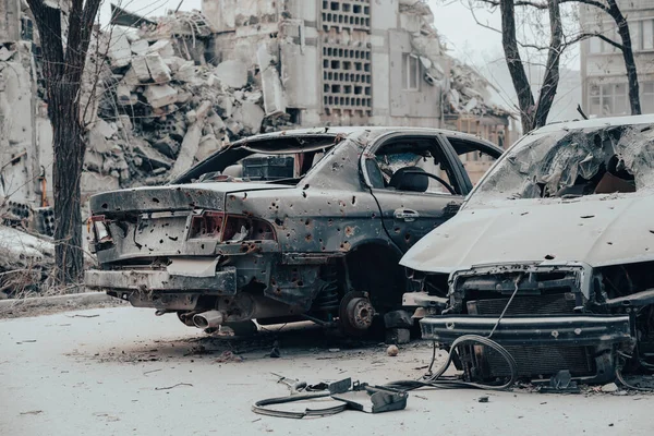 damaged and looted cars in a city in Ukraine during the war with Russia