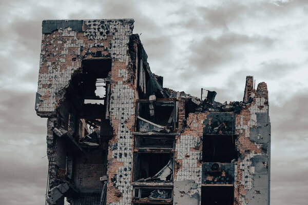 destroyed and burned houses in the city during the war in Ukraine
