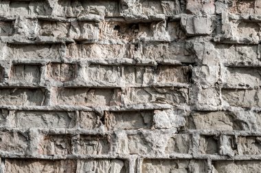 Eski yıkık tuğla duvarın doku deseni detaylı arkaplanı kapat