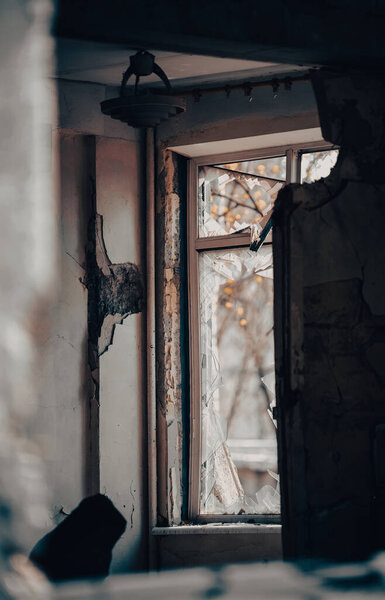 destroyed and burned school in the city during the war in Ukraine