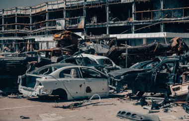damaged and looted cars in a city in Ukraine during the war with Russia