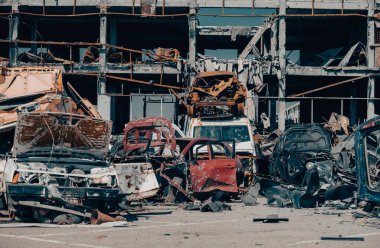 damaged and looted cars in a city in Ukraine during the war with Russia