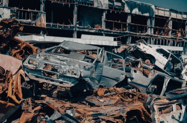 damaged and looted cars in a city in Ukraine during the war with Russia