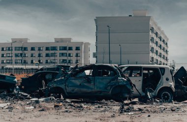 damaged and looted cars in a city in Ukraine during the war with Russia