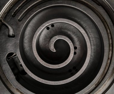 Metal spiral parça mekanizması endüstriyel arkaplan kapat