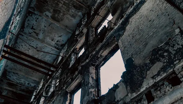 stock image destroyed school in a city lost in the war in Ukraine without people