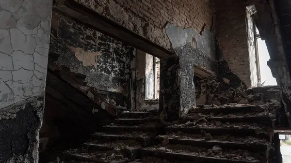 stock image destroyed building in a city lost during the war with Ukraine without people