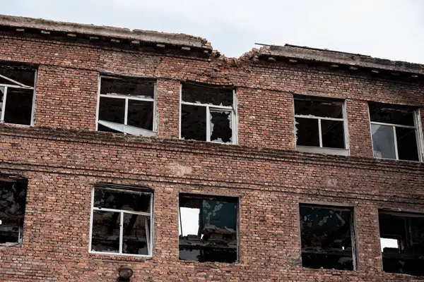 stock image destroyed building in a city lost during the war with Ukraine without people