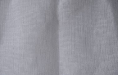 Beyazlatılmış beyaz keten kumaş. Buruşmuş organik keten. Doğal yaşam tarzı. Boşluğu kopyala.