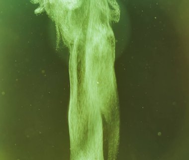 Vapor spray. Steam cloud isolated on a warm pale green background.