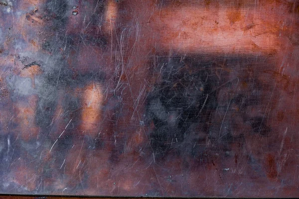 Grunge copper foil. Copper background. Reflection.
