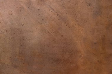 Oksitlenmiş benekli bakır arka plan. Doğal ışıklandırma sol üst köşede..