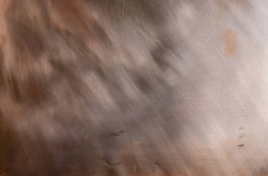 Bakır doku arka planı. Metal plaka. Sağ ışıklandırma.